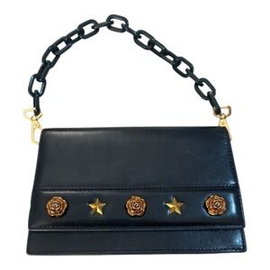 Mo&Co | black leather mini bag with gold hardware star + rose studs chain handle